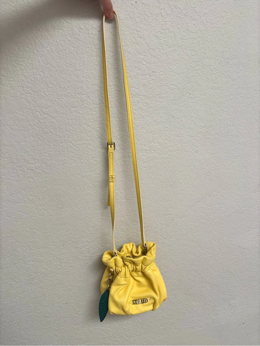 Staud / mini Grace leather crossbody bag in yellow